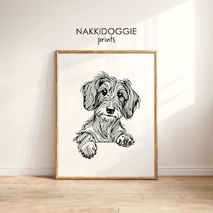 May include: Black and white line art illustration of a wirehaired dachshund dog looking at the viewer with its paw resting on a surface. The image is titled "NAKKIDOGGIE prints".