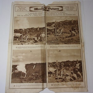 May include: A black and white newspaper clipping from the New York World Pictures, dated September 3, 1916, showing four photographs of trench warfare. The headline reads "A Remarkable Exclusive Series of Photographs Showing Just What Trench Fighting Is - Two Minutes of Actual Battle From the Bursting of a German Shell Over the British Trenches Until the Answering Shot."