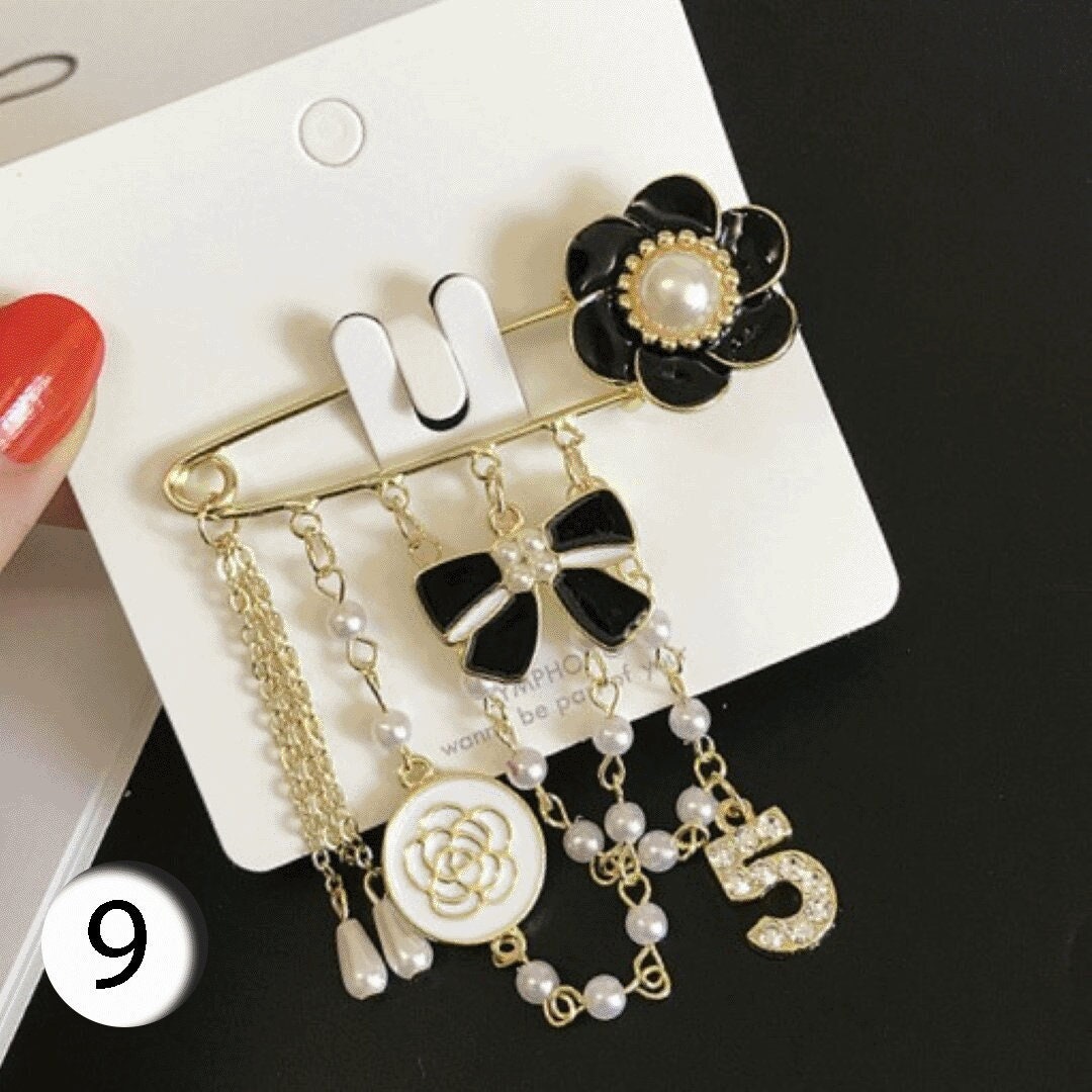 Chanel safety hotsell pin brooch