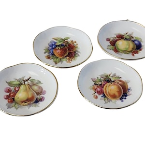 Juego de cuatro platos de té de porcelana Grosvenor de Jackson & Gosling