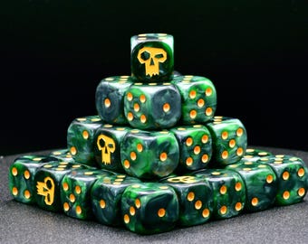 May include: A pyramid of green and black dice with yellow pips and skull symbols. The dice are arranged in a pyramid shape, with the top die featuring a skull symbol. The dice are for tabletop games.