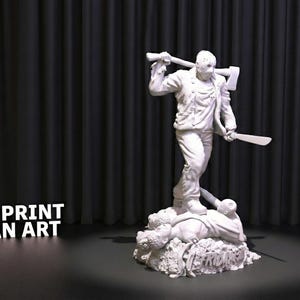 May include: A white 3D-printed statue of a figure in a hockey mask, holding an axe and a machete. The figure stands on a base with other figures. The text "3DPRINT FAN ART" is visible.