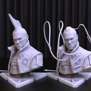 May include: Two white 3D printed busts of a man with a mohawk hairstyle and a beard. The busts are on triangular bases with a small arrow sticking out of each base. The busts are facing forward and have a futuristic, sci-fi aesthetic.