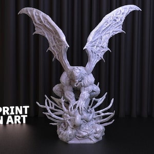 May include: A white 3D printed figurine of a monstrous creature with wings, standing on a base with a smaller creature underneath. The figurine is a fan art creation.