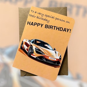 May include: A birthday card with a yellow sports car on the front. The card has the text "To a very special person on their birthday HAPPY BIRTHDAY!" and the car has a license plate that says "JASON".