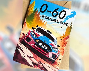 May include: A birthday card featuring a blue and red race car on a dirt road with trees in the background. The card says "0-60 in the blink of an eye!" and "John" on the license plate.
