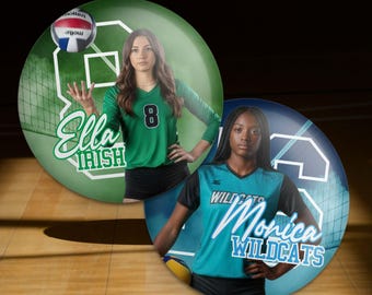 May include: Two round volleyball-themed designs featuring female athletes. One design has a green background with the name "Ella Irish" and a volleyball. The other design has a blue background with the name "Monica Wildcats".