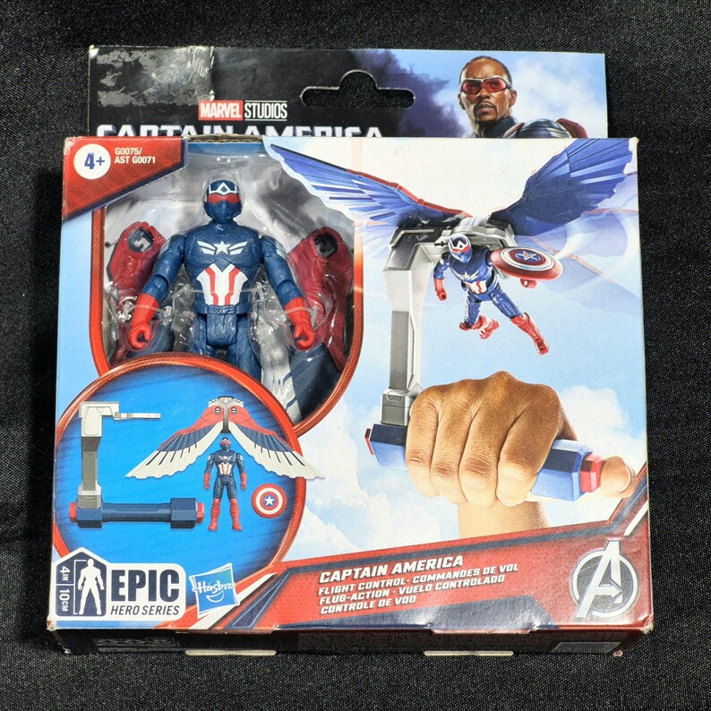 May include: A Marvel Studios Captain America Epic Hero Series action figure in packaging. The blue and red figure features a star emblem and detachable wings. The box displays the character, flight control accessories, and the Avengers logo.