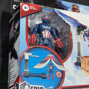 May include: A Hasbro Epic Hero Series Captain America action figure in its original packaging. The figure is blue, white, and red with a mask and wings. The box displays the text Captain America, Epic Hero Series, and 4 inches/10 cm.