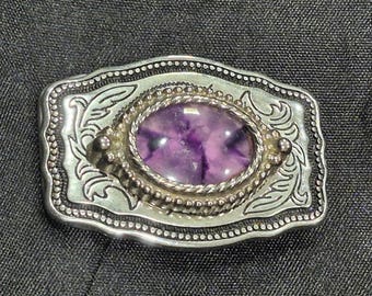 Silver-Toned Western Belt Buckle with Engraved Floral Pattern & Large Raised Purple Stone