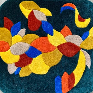 multi-colored handmade tufted rug