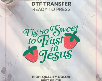 May include: A green and red DTF transfer design with the text "Tis so Sweet to Trust in Jesus" and two strawberries. The design is ready to press.