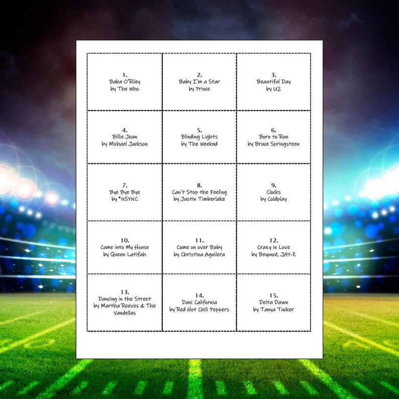 May include: A white sheet with a grid of 15 squares, each containing a song title and artist. Songs include "Baba O'Riley" by The Who, "Baby I'm a Star" by Prince, and "Beautiful Day" by U2. The background is a green field with stadium lights.