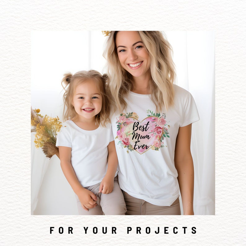 May include: Two white t-shirts with a floral heart design. The larger shirt says "Best Mum Ever".