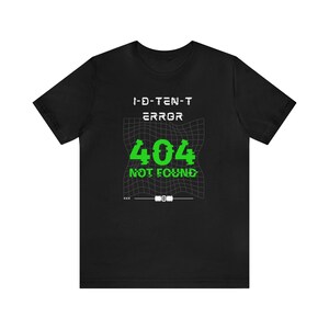 May include: Black t-shirt with a white graphic of a computer error message. The text reads "I-D-TEN-T ERROR 404 NOT FOUND".