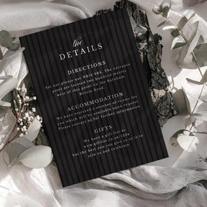 adding details card with black stripes and white elegant text