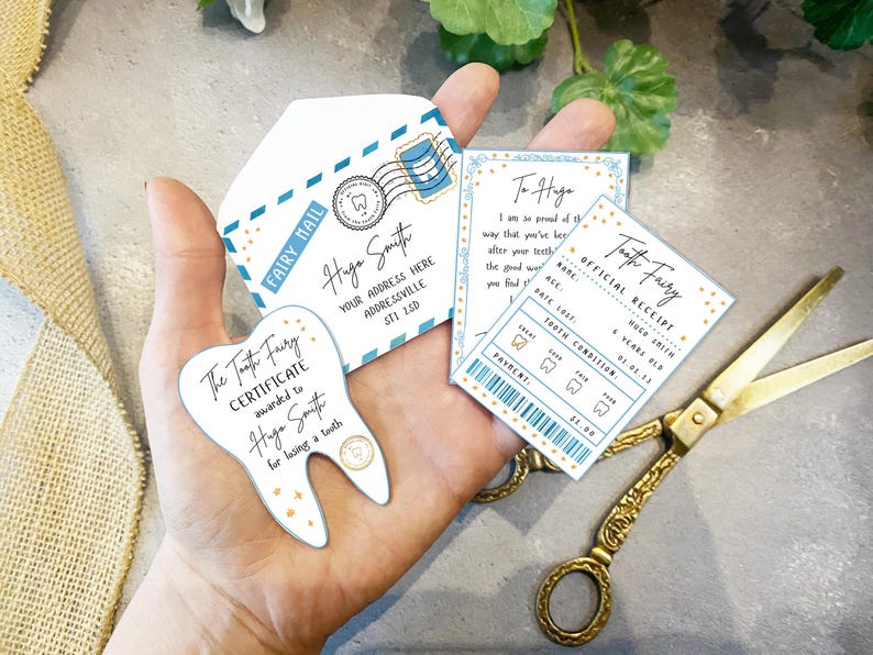 mini tooth fairy set in blue including an envelope, certificate, tooth receipt and letter