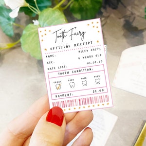 May include: A pink and gold tooth fairy receipt with a gold star border. The receipt has the text "Tooth Fairy Official Receipt" and includes fields for name, age, date lost, and tooth condition. The tooth condition section has four icons representing different tooth conditions: great, good, fair, and poor. The receipt also includes a payment section with a barcode and the amount $1.00.