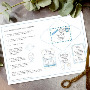 May include: Printable instructions for a tooth fairy letter set. The set includes a letter, certificate, receipt, and envelope. The envelope is blue with a white border and has a stamp with a tooth fairy on it. The certificate is a tooth shape with a gold star and the text "The Tooth Fairy Certificate awarded to Hugo Smith".