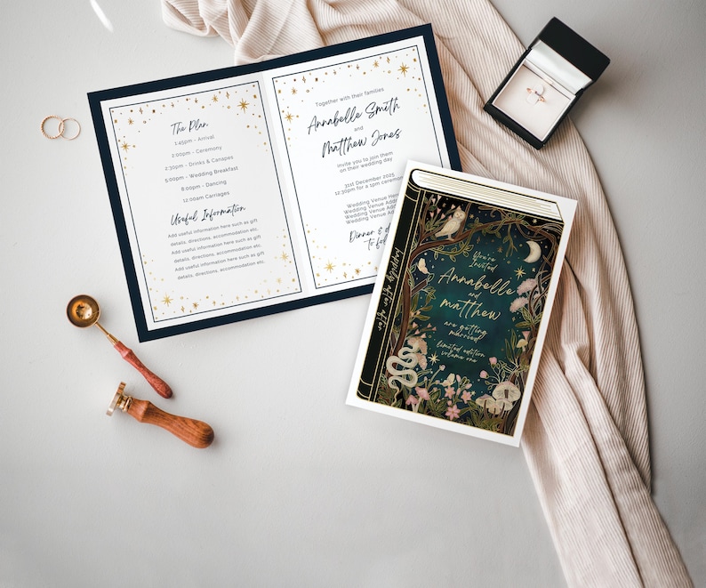 May include: A wedding invitation with a dark blue and gold design. The invitation features a book cover with a forest scene and the text "You're Invited Annabella and Matthew are getting married".