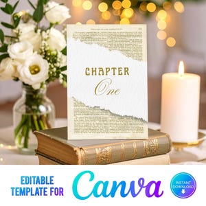 May include: A table setting with a white candle, a bouquet of white flowers, and a decorative card that reads "Chapter One." The card has a vintage paper design. The word "Canva" is displayed in a colorful font.