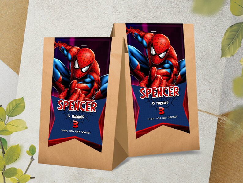 May include: Two brown paper treat bags with a Spiderman graphic. The Spiderman image is red and blue, with the name "Spencer" and the number "3" on a blue banner. Text reads "is turning" and "Thank you for coming!"