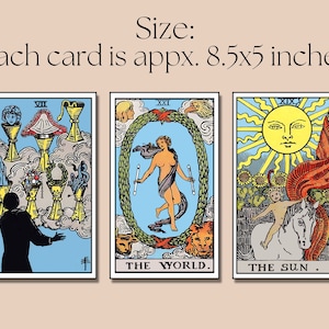 May include: Three tarot cards, each measuring approximately 8.5 by 5 inches. The cards are from the Rider-Waite tarot deck and depict the following scenes: The Chariot, The World, and The Sun.