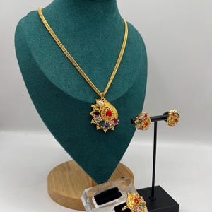 Gold chain with Navaratna pendant earrings and ring set
