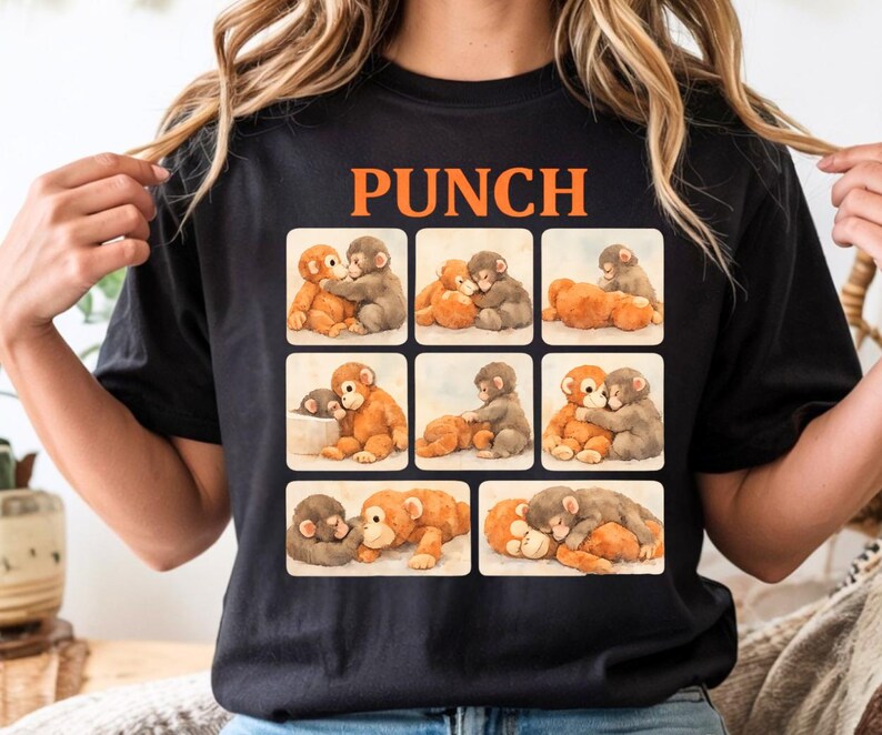 A black t-shirt with a collage of nine images depicting various monkey interactions, including hugging, cuddling, and playing.