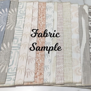 May include: A collection of fabric swatches in various patterns and colors, including blue, gray, beige, and brown. The swatches are arranged in a row and labeled "Fabric Sample".