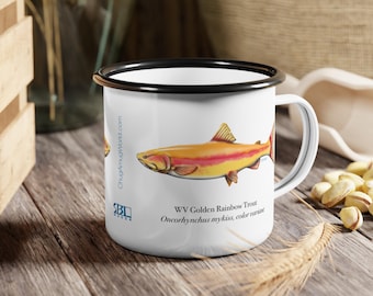 May include: White enamel mug with a black rim and handle, featuring a colorful illustration of a WV Golden Rainbow Trout. The fish is depicted in shades of yellow, orange, and red. Text includes "ChugAmugWorld.com" and fish details.