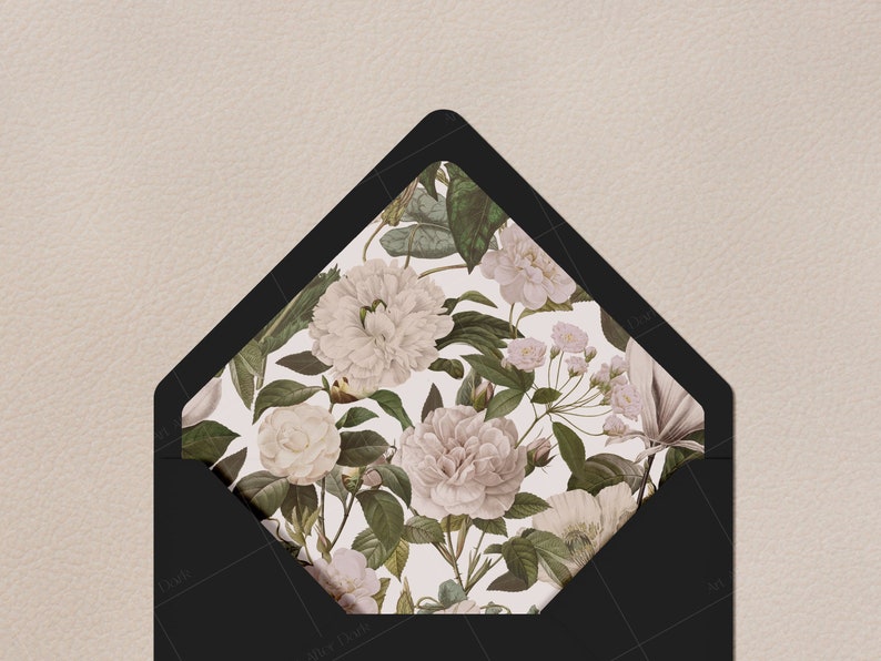 May include: An open black envelope featuring a decorative interior liner with a botanical print. The pattern displays various white and pale pink flowers, including large peonies and smaller blossoms, interspersed with dark green leaves on a cream background.