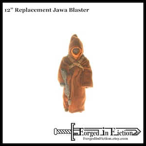 May include: A 12-inch tall brown Jawa action figure with a black face mask and a gray blaster rifle. The figure is wearing a brown hooded robe with a brown belt and a brown sash.