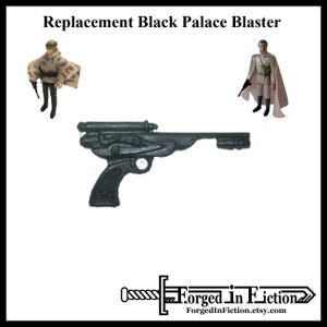 May include: Replacement black plastic blaster for a Star Wars action figure. The blaster has a black handle and a black barrel with a silver detail.