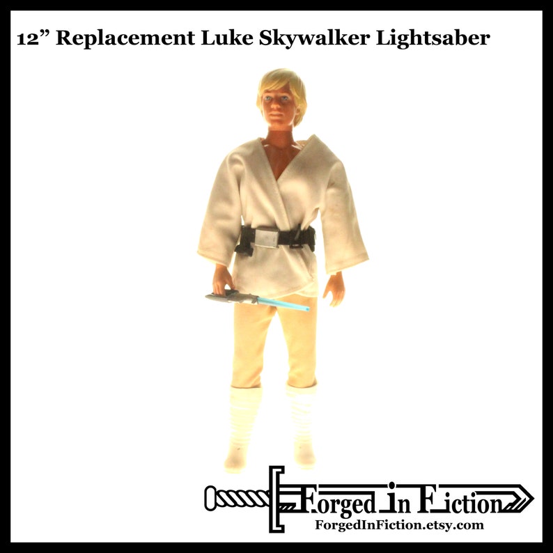 May include: 12" replacement lightsaber for a vintage Luke Skywalker action figure. The lightsaber is blue and white and is held by the figure. The figure is wearing a white robe and brown pants.