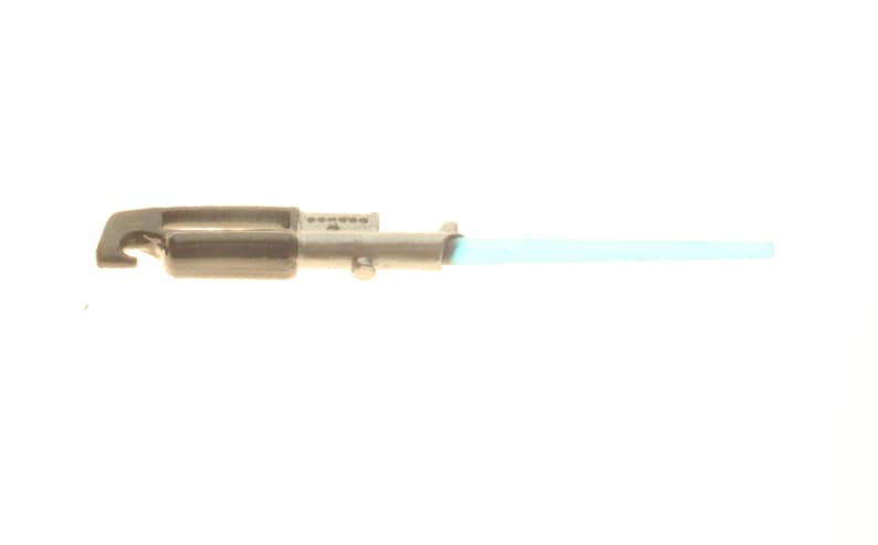 May include: A black and silver toy lightsaber with a blue blade. The lightsaber is a popular toy for children and adults who enjoy Star Wars.