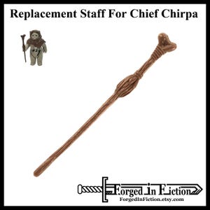 May include: A brown wooden staff with a bone-shaped top. This staff is a replacement for the one used by Chief Chirpa in the Star Wars franchise.