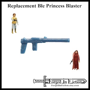 May include: Blue plastic blaster toy for a Star Wars action figure. The blaster is a replacement part for a vintage Princess Leia figure.