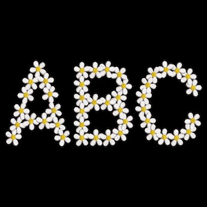 May include: The letters "ABC" are formed with white daisy flowers with yellow centers against a black background. The floral letters are arranged in a row, creating a decorative and natural design.