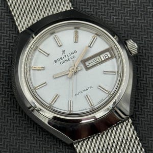 Breitling Automatic.Date day Dial color white man's watch Eta movement authentic
