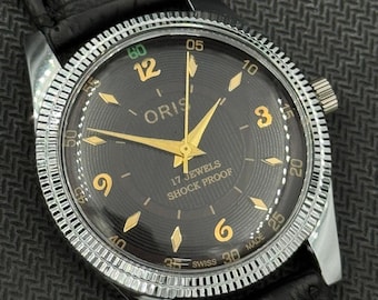 Reloj de pulsera suizo para hombre Oris ST-96, vintage, con esfera negra y movimiento FHF de cuerda manual.