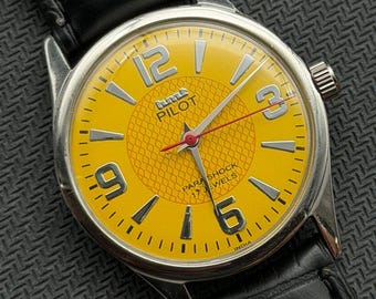 Reloj de pulsera vintage HMT Pilot mecánico de cuerda manual con esfera amarilla y 17 joyas para hombre.