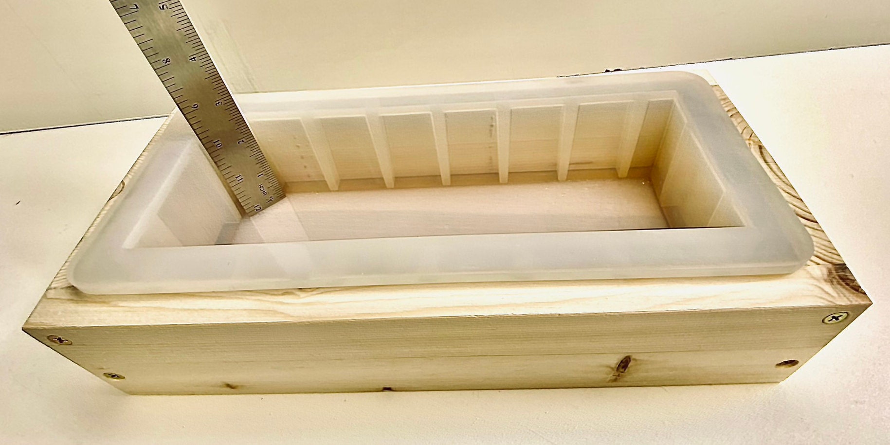 Silicone Soap Loaf Mold With Sliding Bottom and a Wood Top. the