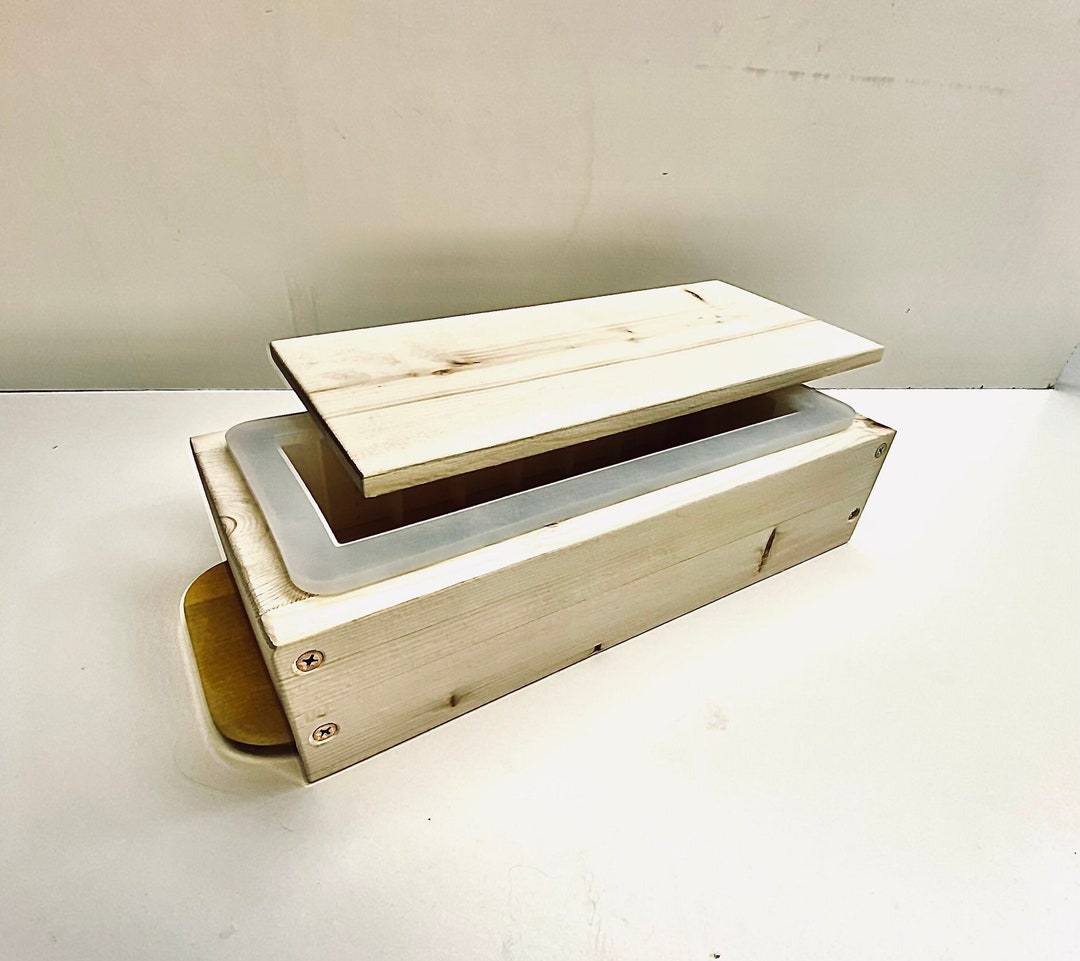 Silicone Soap Loaf Mold With Sliding Bottom and a Wood Top. the