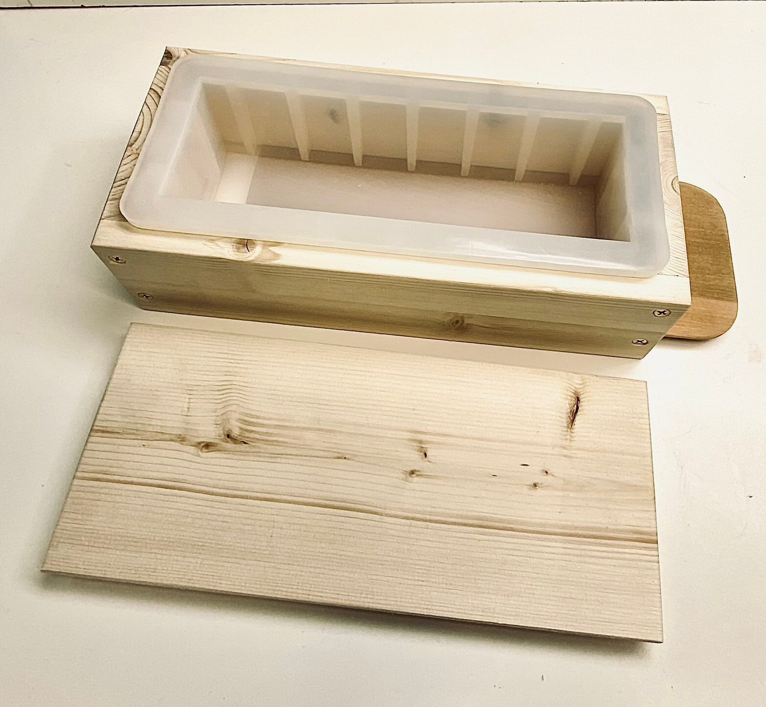 Silicone Soap Loaf Mold With Sliding Bottom and a Wood Top. the