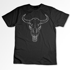 May include: A black t-shirt with a white outline of a bull skull.