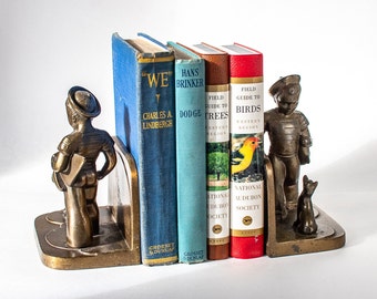 Art deco sailor boy and dog bookends, cast metal sculpture bookends, vintage, antique, 1920s era bookends,  Frankart New York