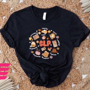 a black t - shirt with the words glp on it