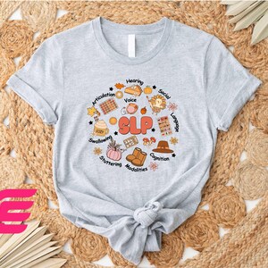 a women's tshirt with an image of a bunch of items on