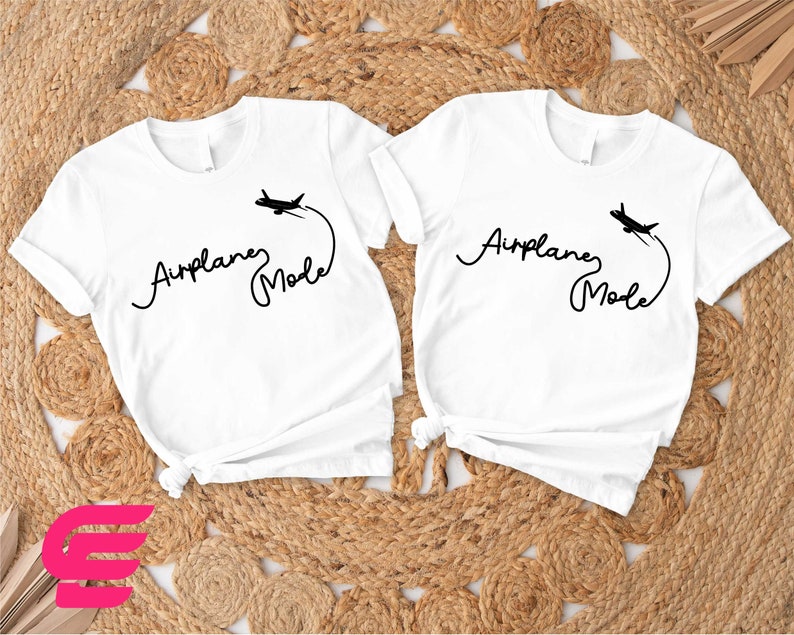 two t - shirts with the names of two people on them